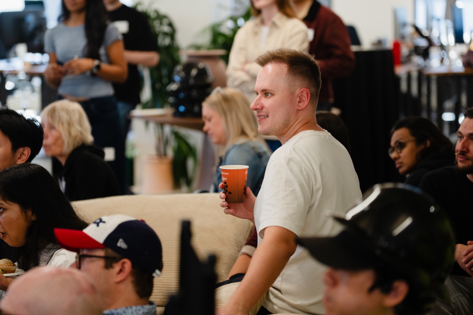 Gregory Shevchenko in the audience during demo sessions, Profound hackathon event photography